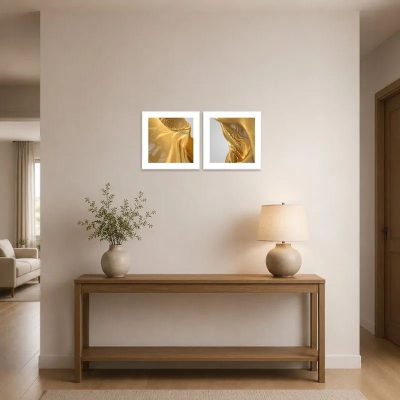 Golden Satin abstract prints welcome guests in an entrance hall with a stylish console table.
