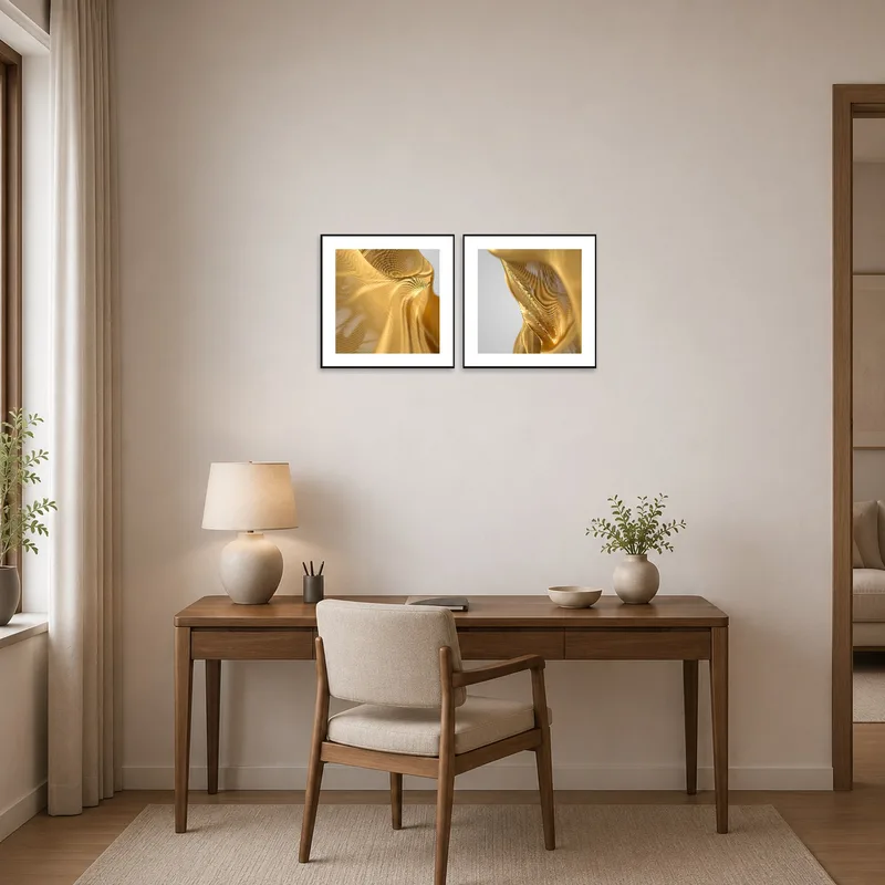 Home office with a desk where the Golden Satin abstract prints inspire a creative work atmosphere.
