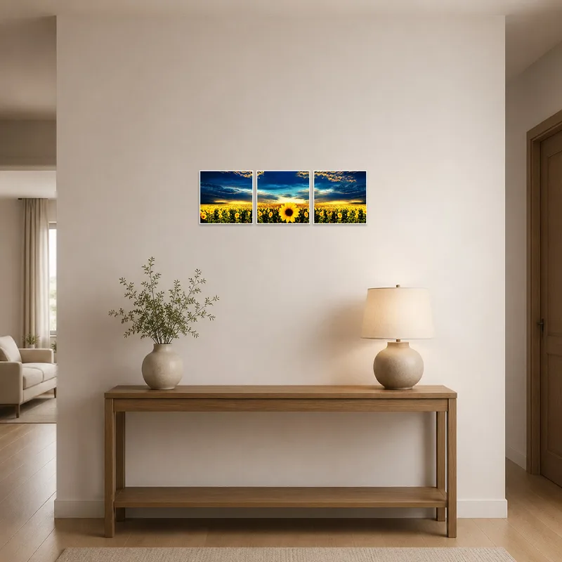 An entrance hall with the 'Golden Sunflower Fields at Dusk Triptych Set' welcoming guests with its vibrant hues.