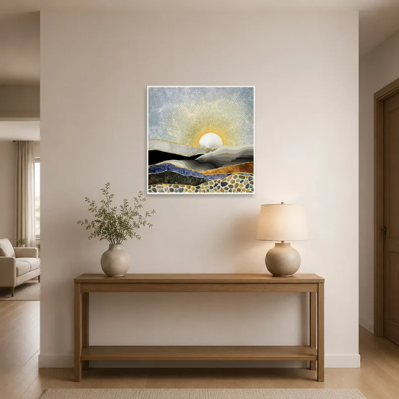 Entrance hall displaying art of a golden sunrise casting light on abstract mountains.
