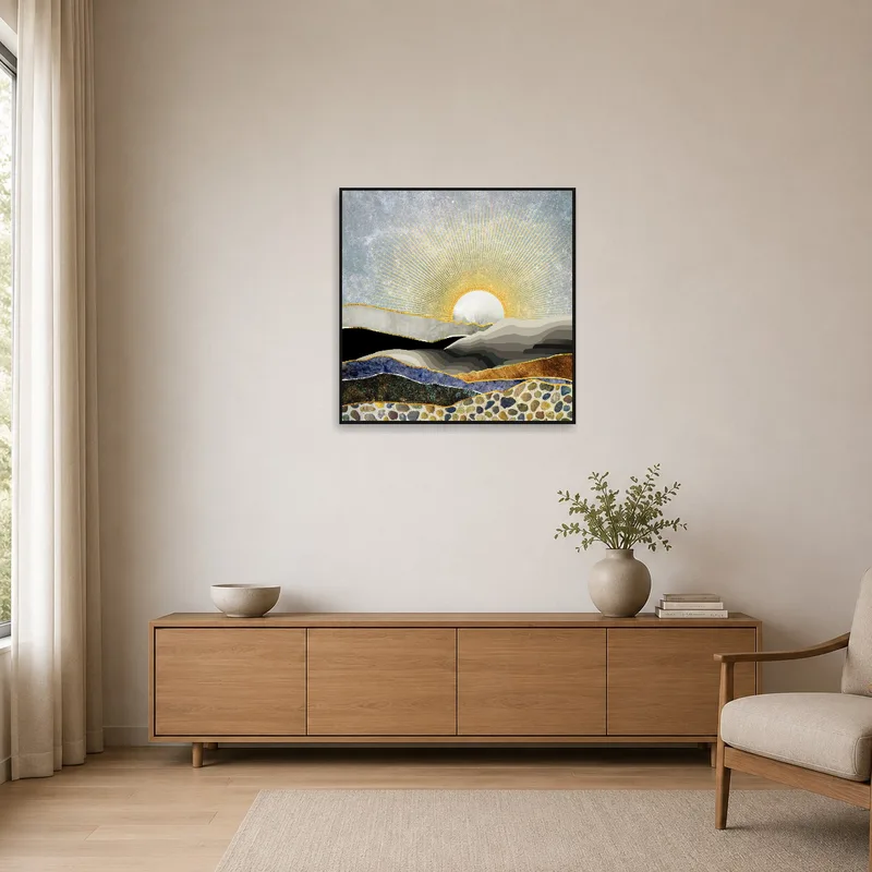 Minimalist room featuring art of a golden sunrise with abstract mountain shapes.
