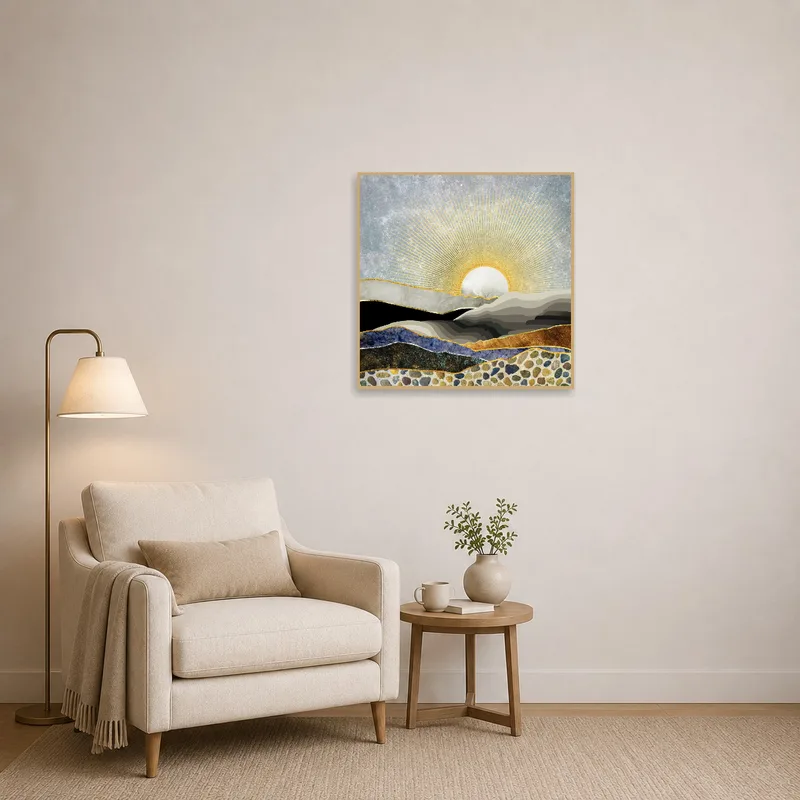 Reading corner enhanced by art depicting a golden sunrise above abstract mountains.