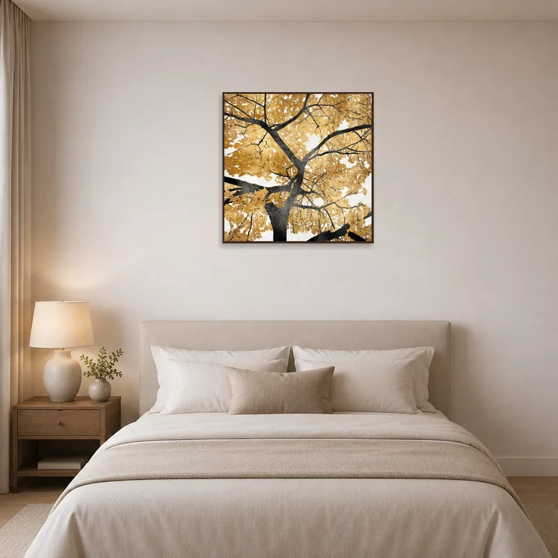 Golden tree silhouette print complementing serene bedroom ambiance.