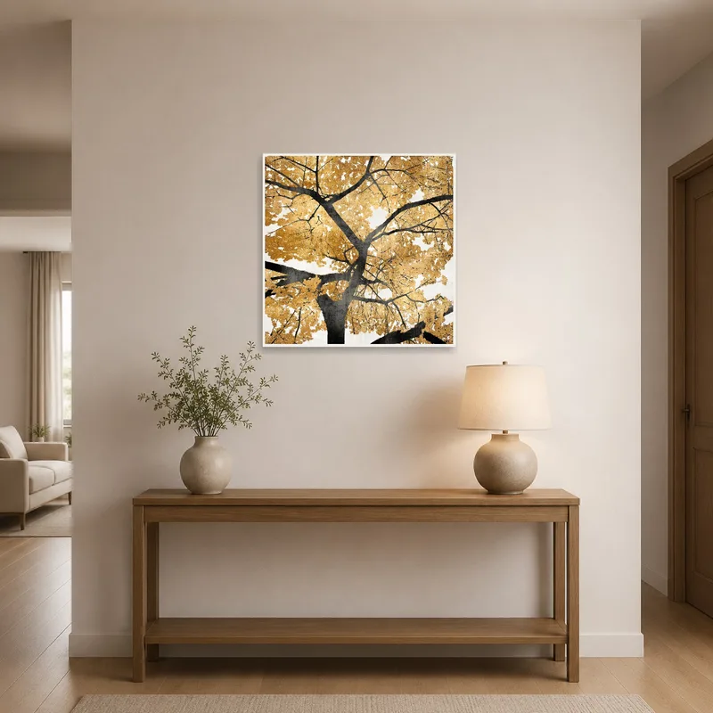 Golden tree silhouette print greeting guests in an entrance hall.