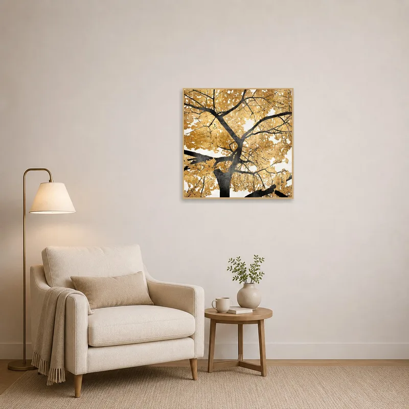 Golden tree silhouette print adding charm to a cozy reading corner.