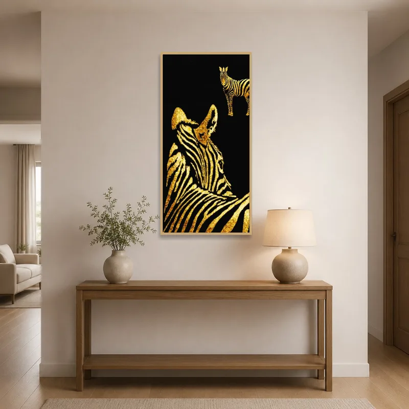 Golden zebra silhouettes welcoming guests in an elegant entrance hall.