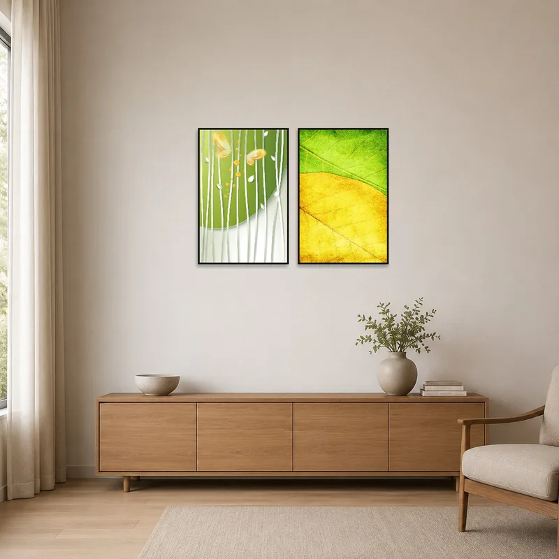 Minimalist space with green and yellow nature prints on a clean white wall.