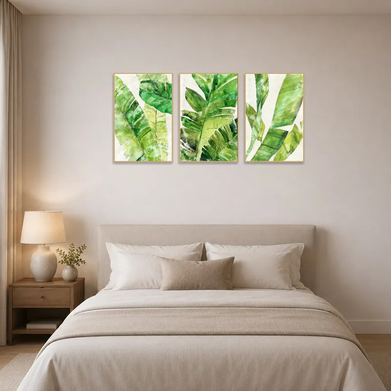Green foliage art set accentuating a serene bedroom setting.