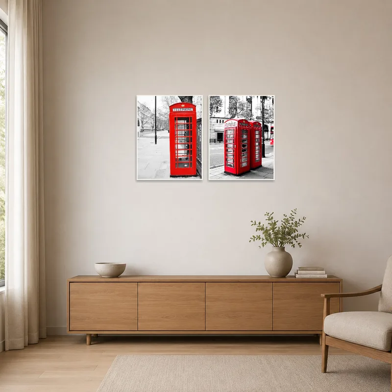 Red telephone booth art adding a pop of color to a minimalist room.