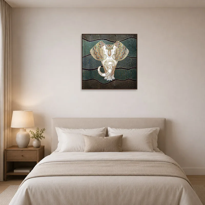 Elephant mandala with gold accents brings warmth to a bedroom setting.