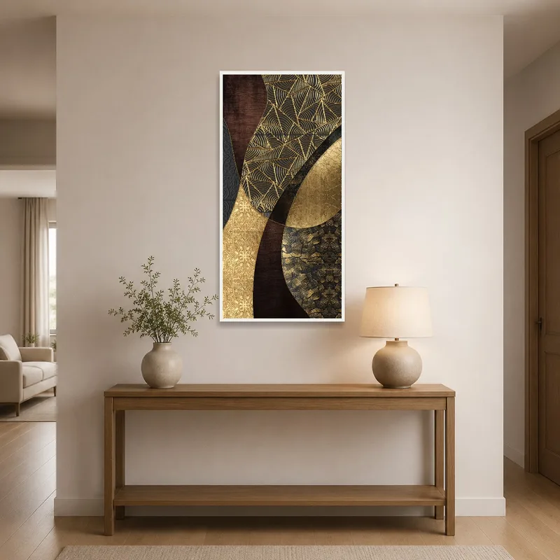 Gold and black geometric art welcomes guests in an elegant entrance hall.
