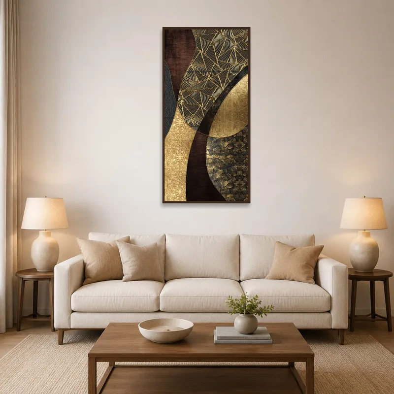 Contemporary gold and black geometric art displayed above a modern living-room sofa.