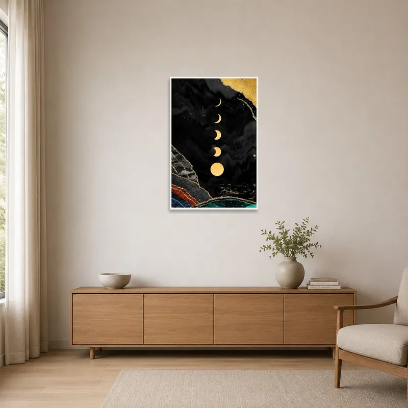 The marble and moon phase artwork adds elegance to a minimalist setting with sparse furniture.