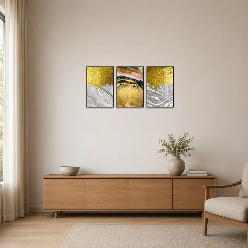 Gold and marble triptych in a minimalist room with simple furniture and neutral tones.