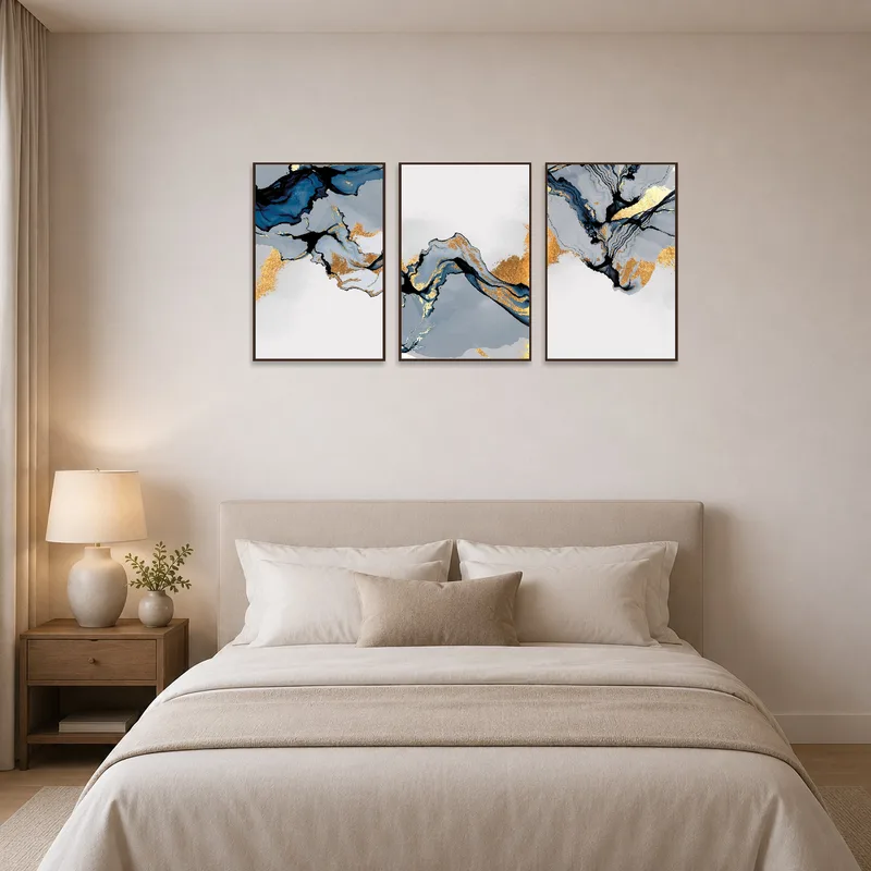 Luxurious triptych set adding a splash of color in a serene bedroom.