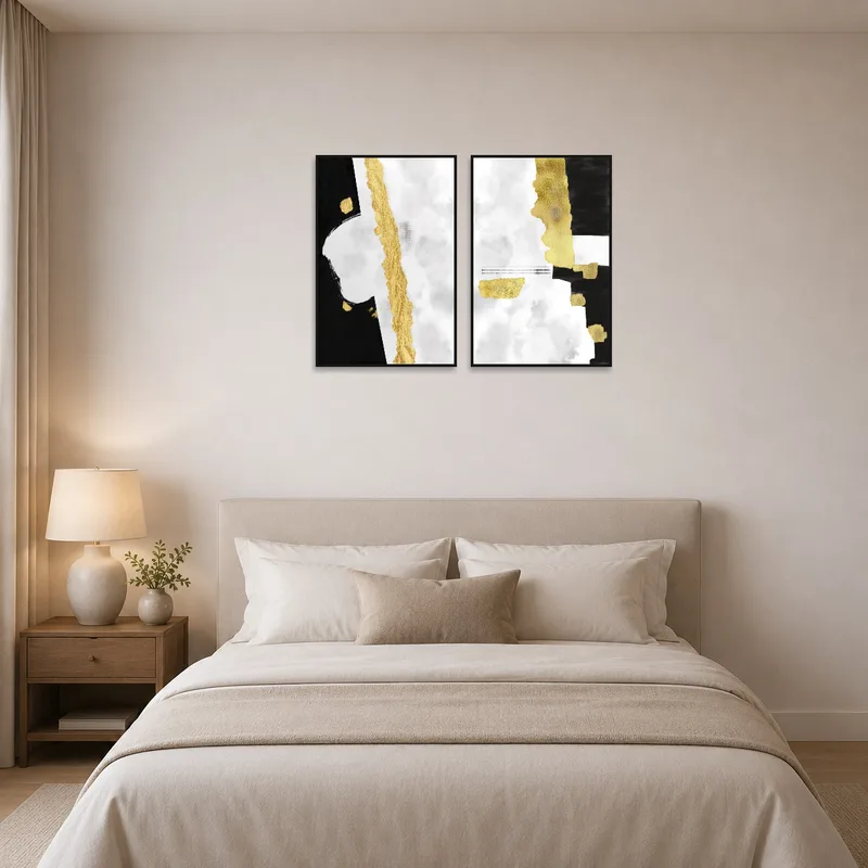 Bedroom with a luxurious abstract diptych in gold and black tones.