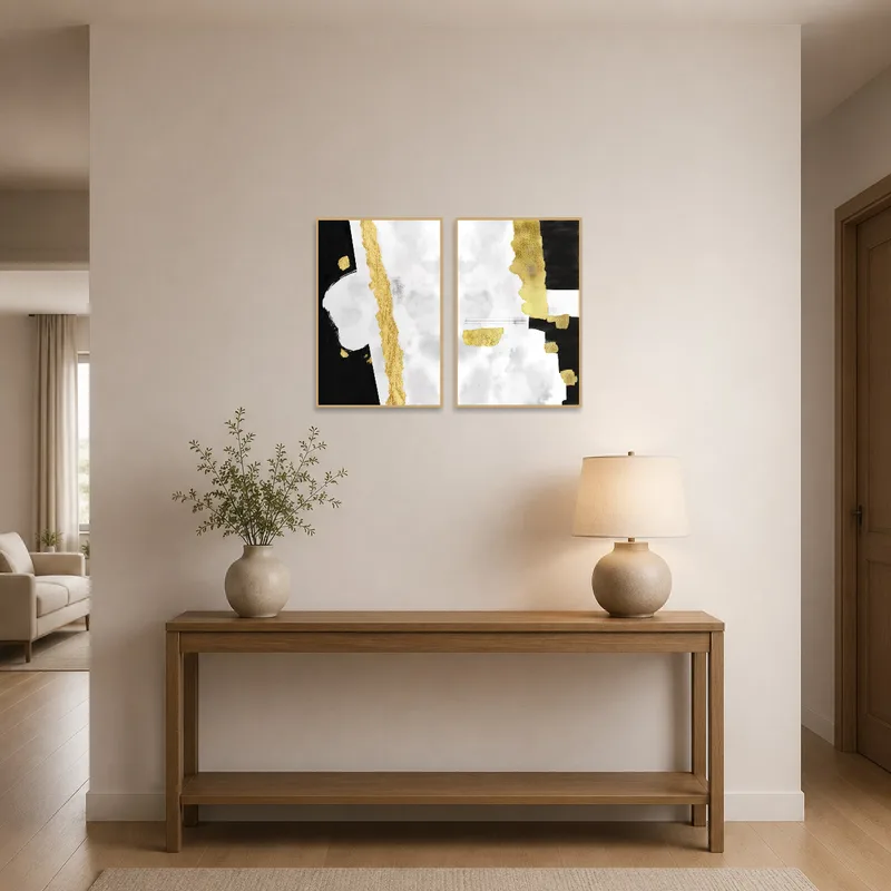 Entrance hall featuring a sophisticated abstract gold and black diptych.