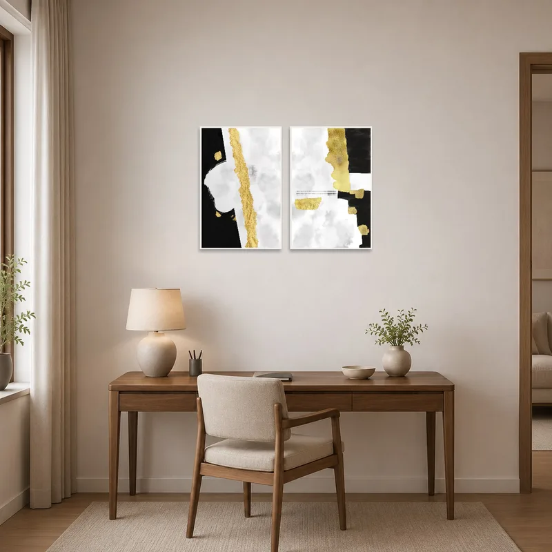 Home office displaying a striking gold and black abstract diptych.