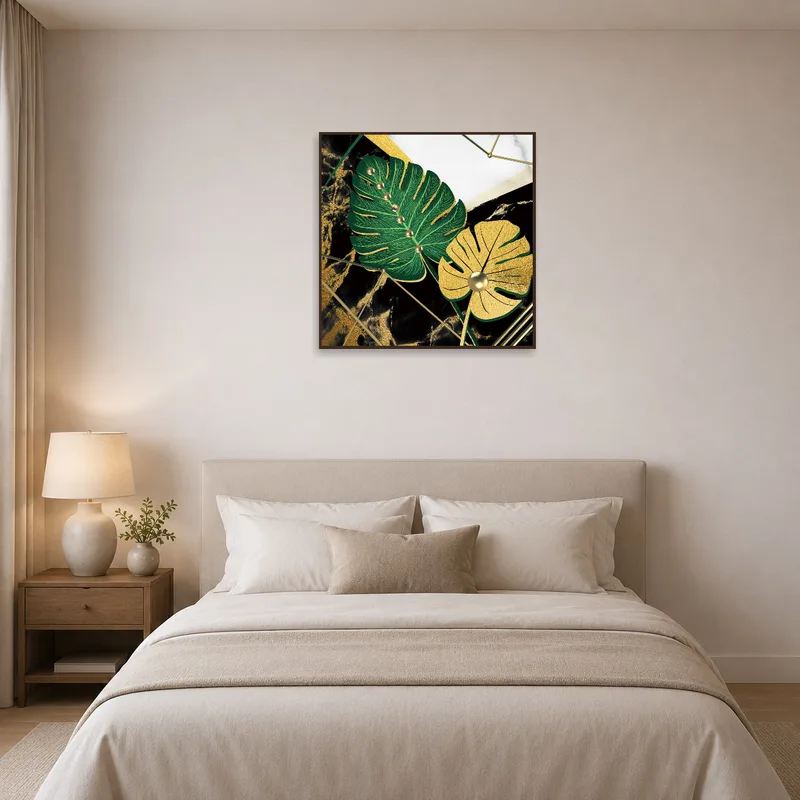 Botanical print with gold highlights complements a serene bedroom ambiance.