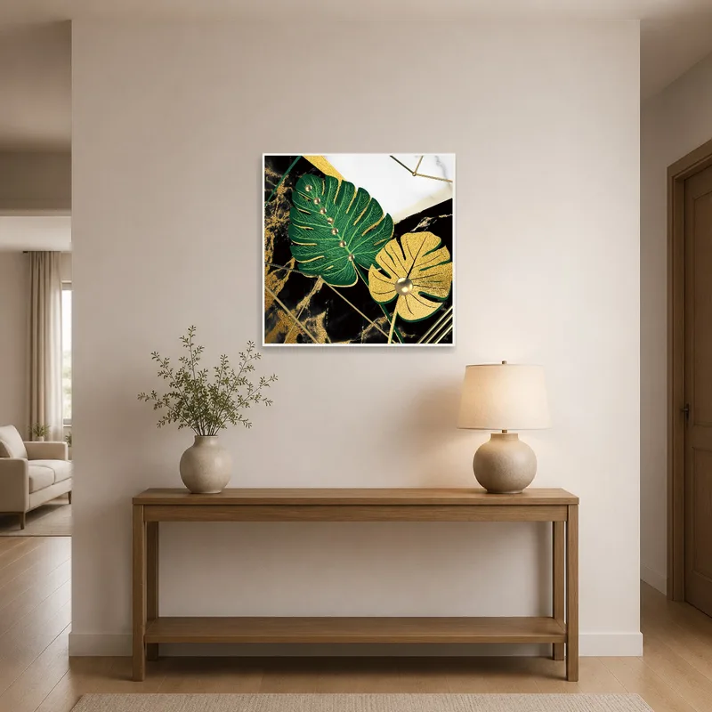 Stylish botanical print greets guests in an entrance hall with gold details.