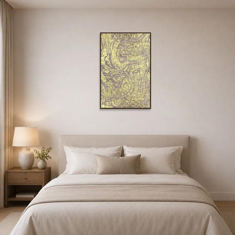 Luxurious abstract art in gold and beige adds warmth to the bedroom decor.