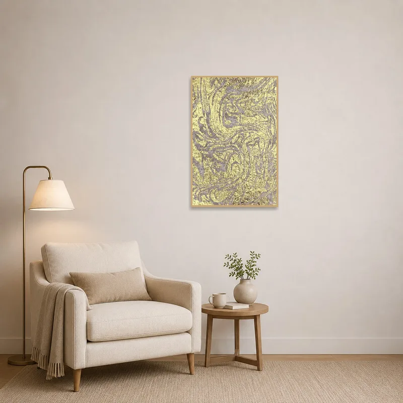 Gold and beige abstract art creates a serene backdrop in the reading corner.