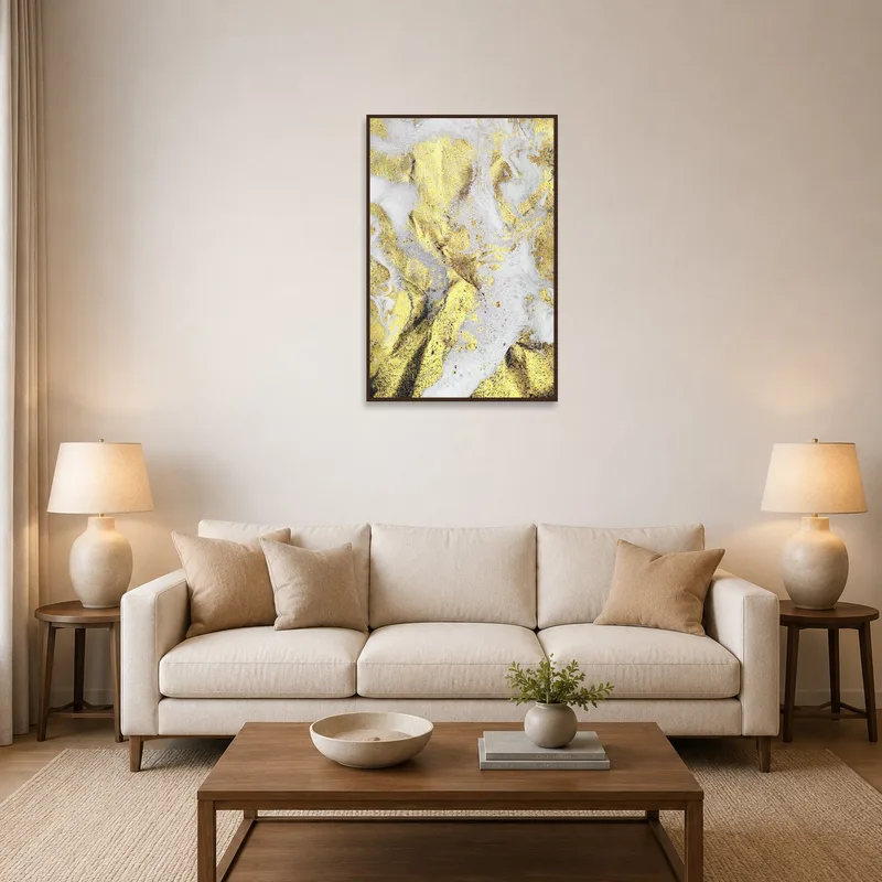 Luxurious gold and white abstract artwork on living room wall above a modern sofa.