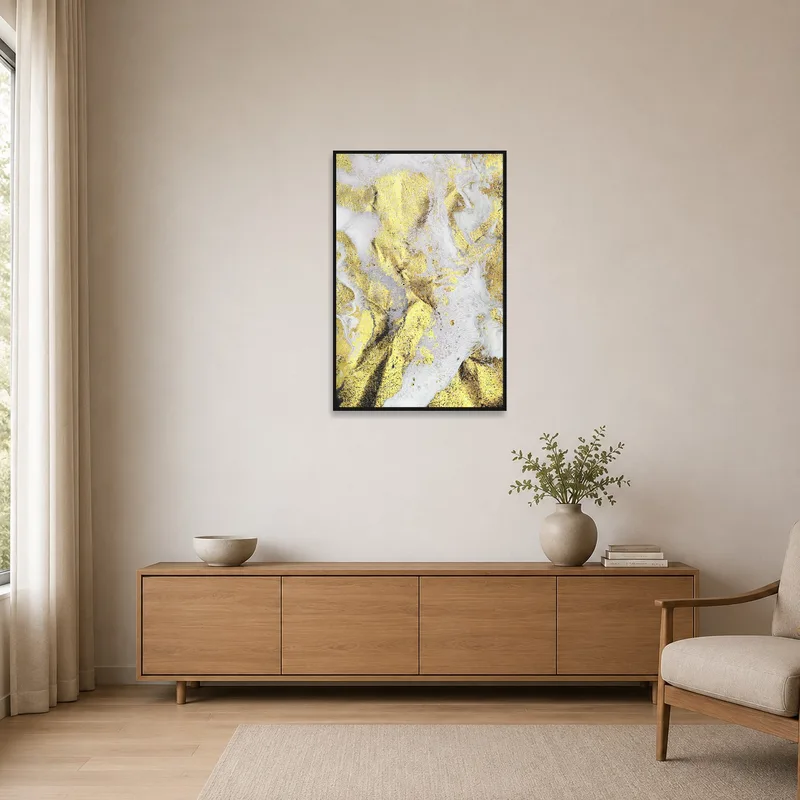 Minimalist room with gold and white abstract piece displayed against a plain wall.