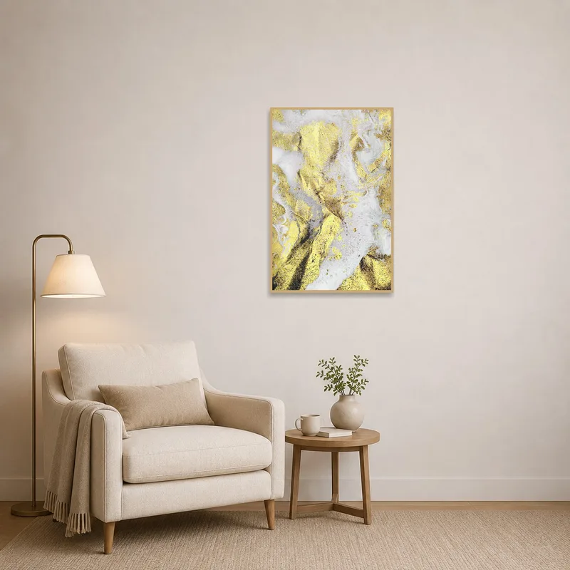 Reading corner with a gold and white abstract piece enhancing a cozy, calm setting.