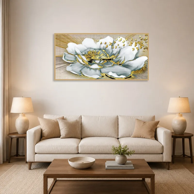 White and gold floral wall art enhancing a cozy living room ambiance.