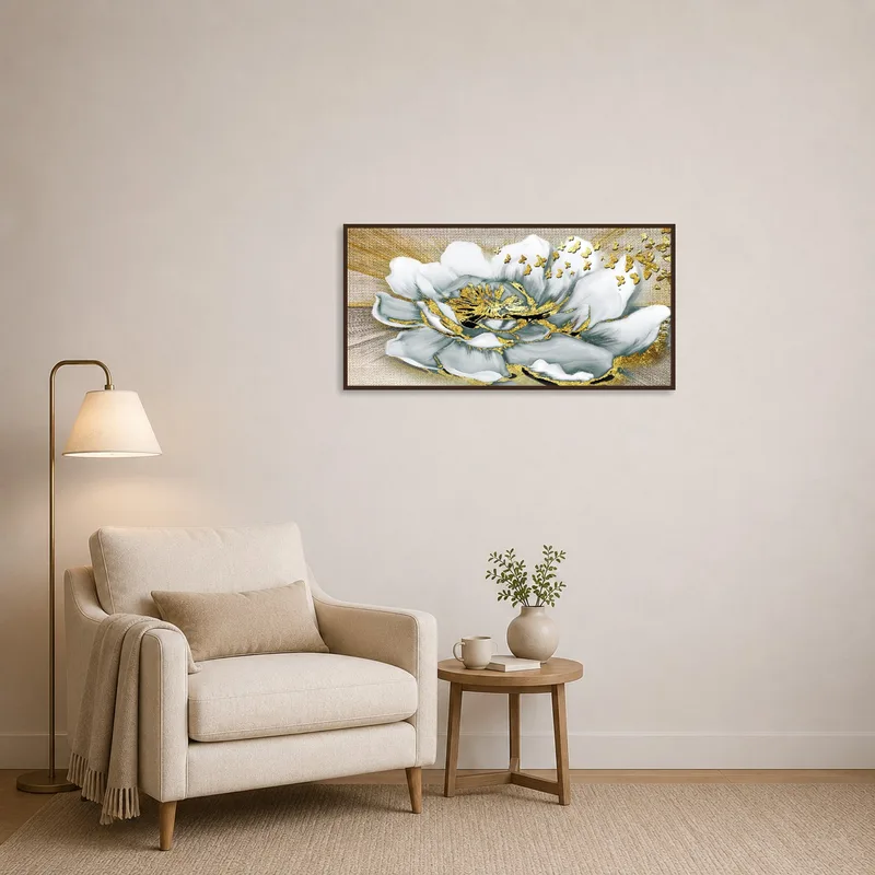 Golden floral wall art bringing elegance to a tranquil reading corner.