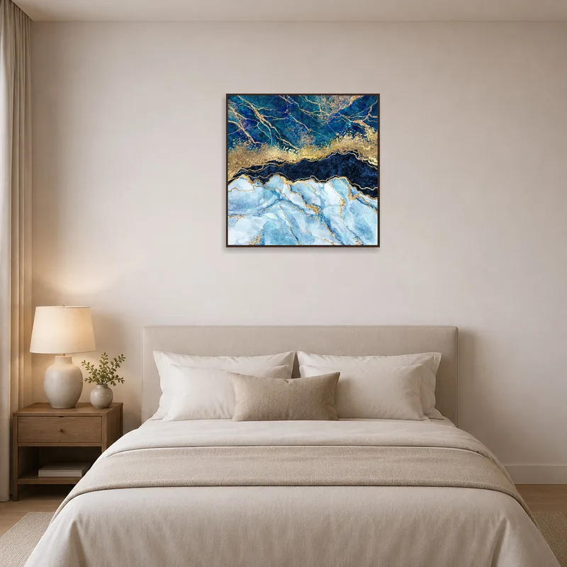 Bedroom with abstract blue and gold marble art print adding elegance above the bed.