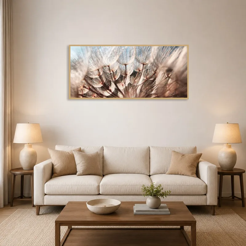 A calming dandelion seedhead art piece accentuates a modern living room wall.