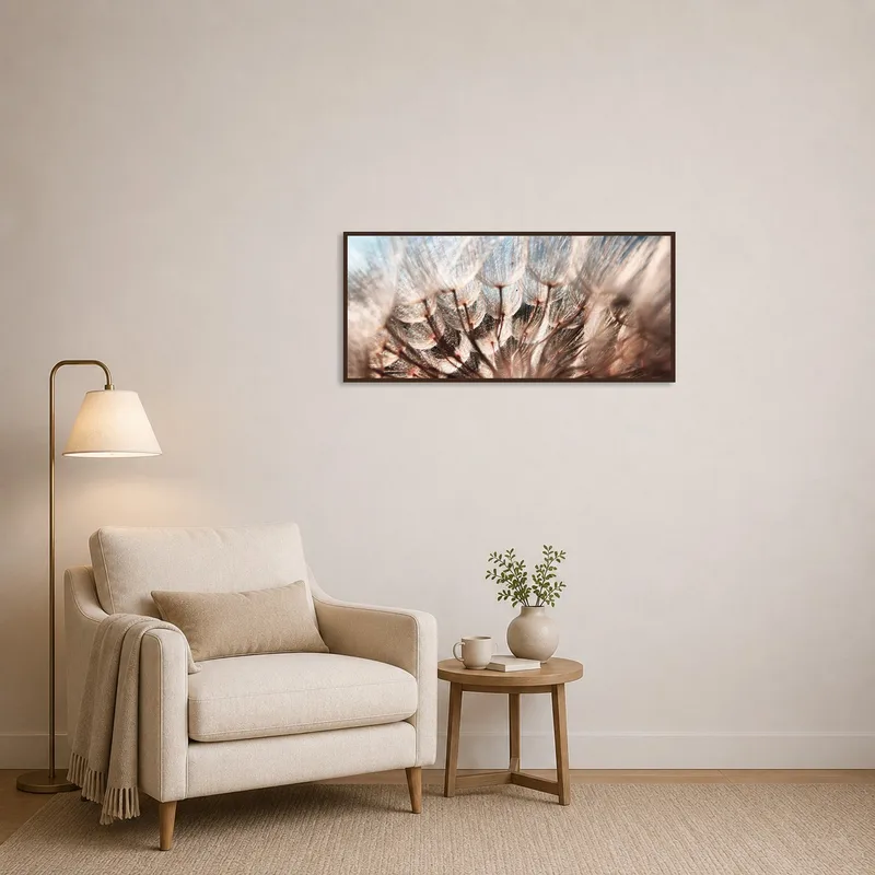Serene dandelion seedhead art is displayed in a cozy reading corner.