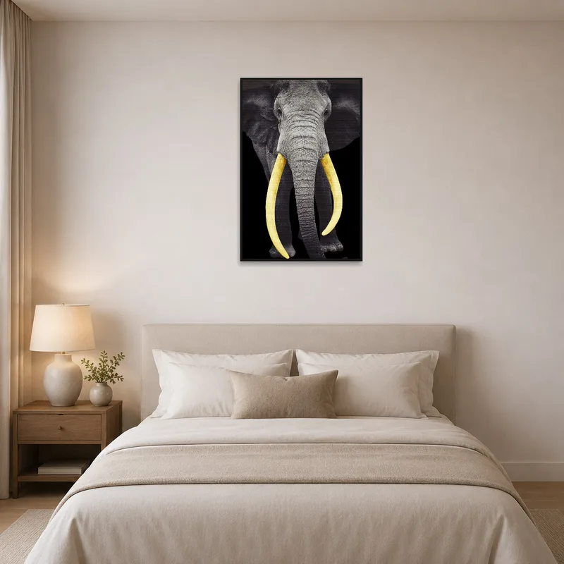 Elephant with golden tusks art print adding charm to a bedroom.