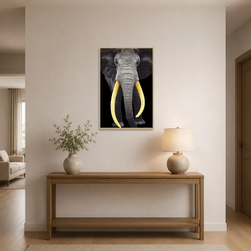 Elephant with golden tusks print adorning an entrance hall wall.