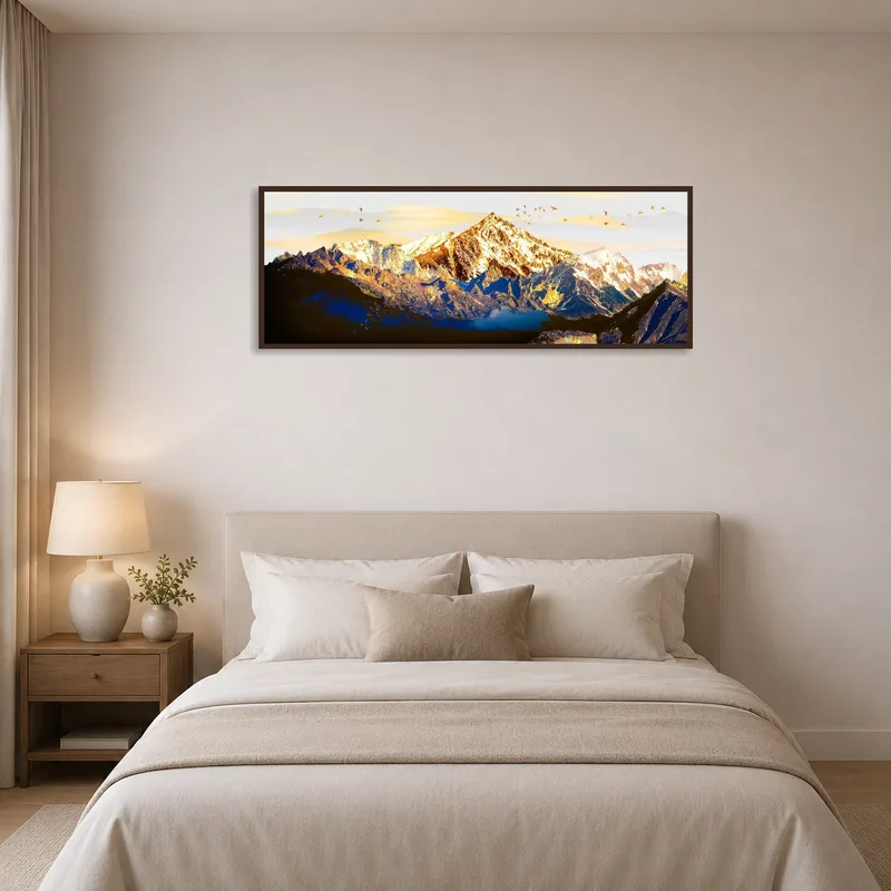 Mountain range print brings tranquility to the bedroom above the bed.