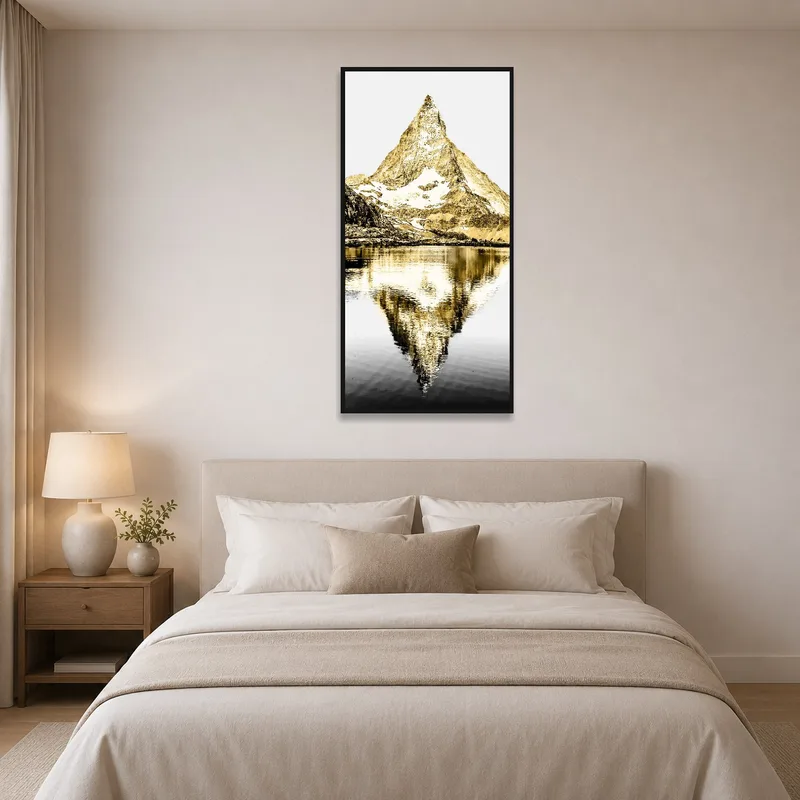 Bedroom adorned with calming mountain reflection artwork.