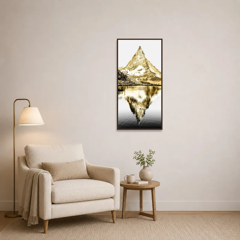 Reading corner with a serene mountain lake print adding tranquility.
