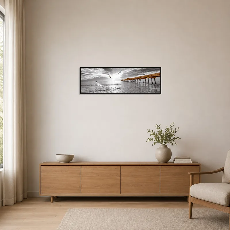 Pier and birds print adding calmness to a minimalist room.