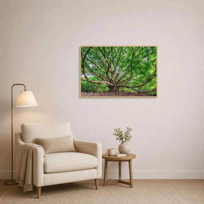 Majestic tree art enhancing a cozy reading corner with a chair and lamp.