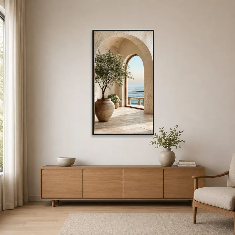 Minimalist room featuring sea view artwork on a clean white wall.