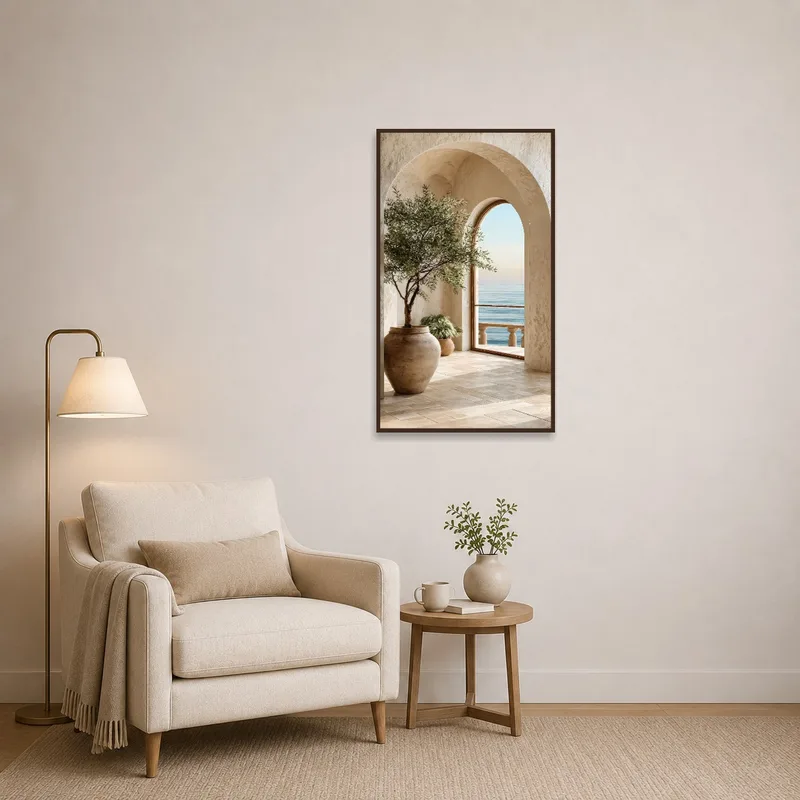 Reading corner with olive tree artwork beside a comfy armchair.