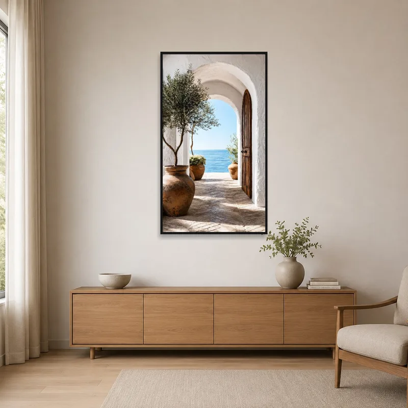 Sea view art under a Mediterranean archway in a minimalist room.