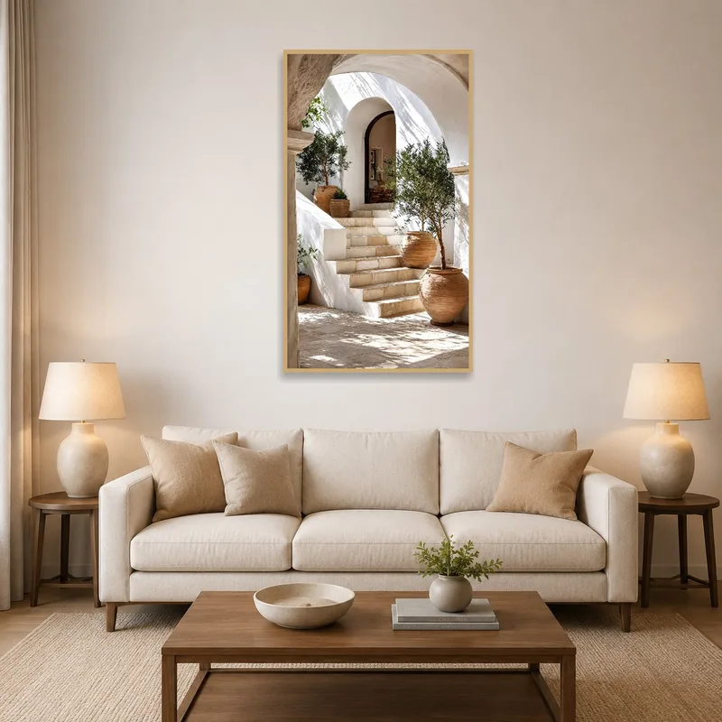 Art print of a Mediterranean courtyard with olive trees in a cozy living room setting.