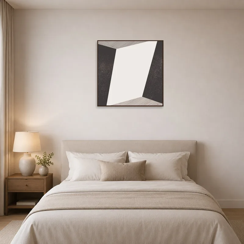A simple geometric abstract print complementing a serene bedroom.