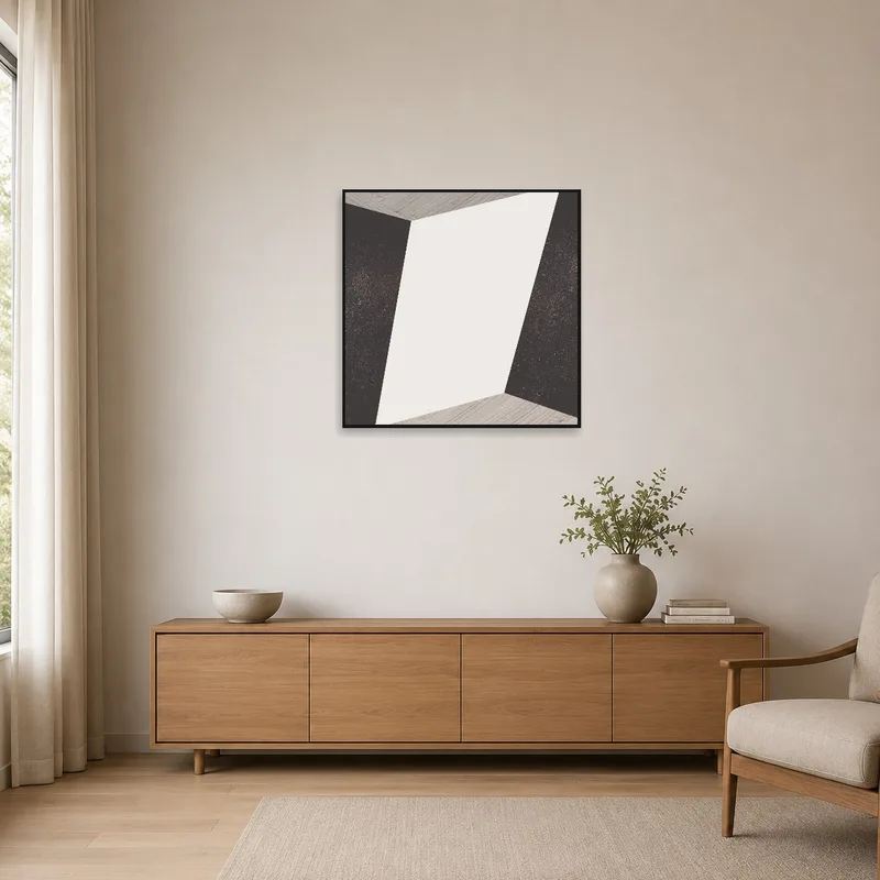 Geometric abstract print enhancing a minimalist room with sleek design.