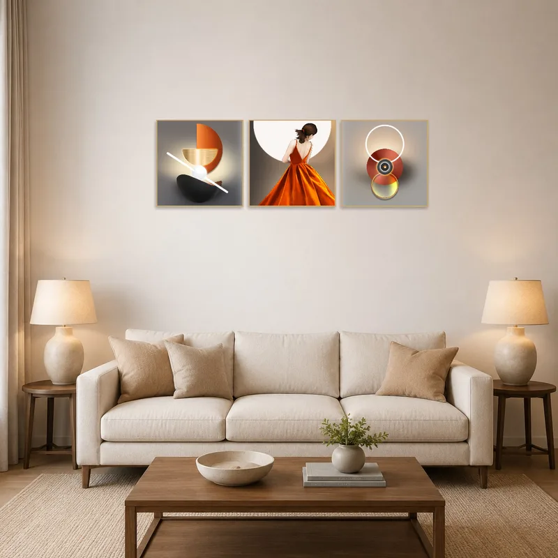 A triptych art set adds vibrancy above the living room sofa.