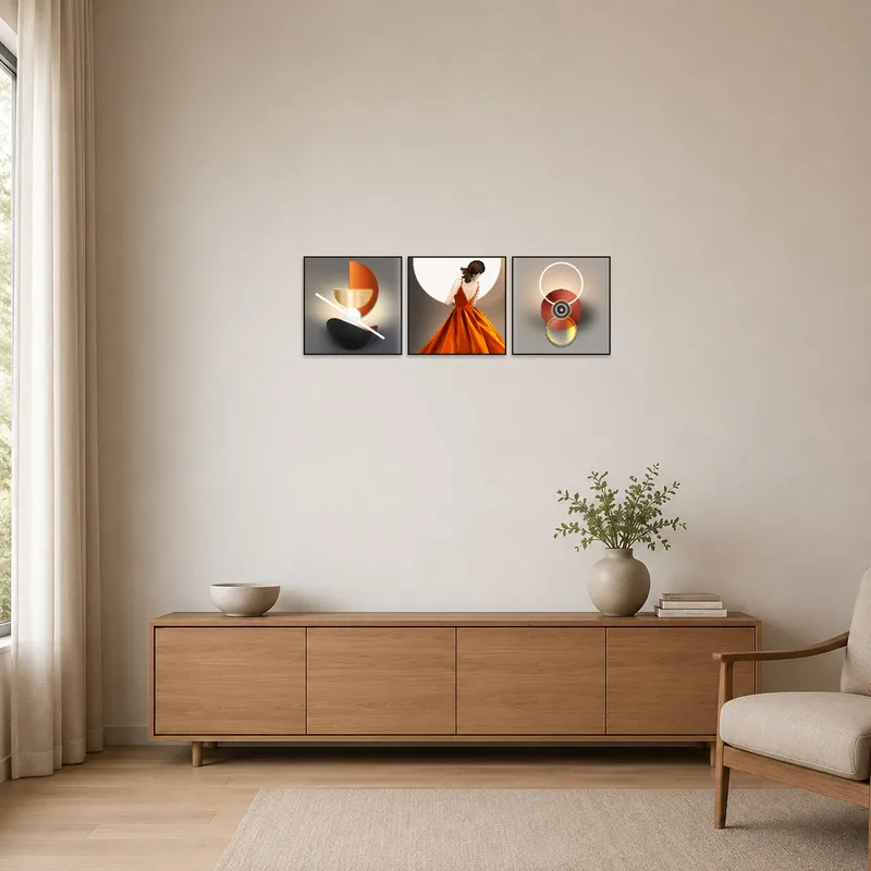 Minimalist room featuring a striking triptych art set on a plain wall.