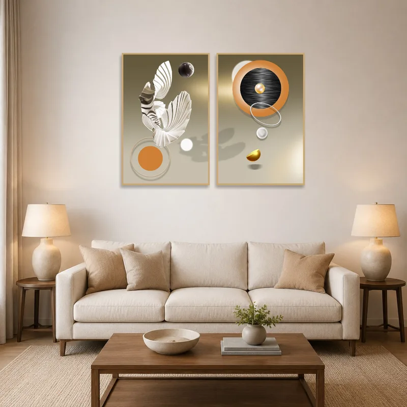 Dual canvas set on a living room wall above a contemporary sofa.
